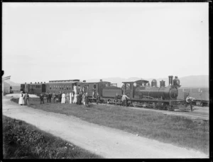 Steam train and group, Te Aute railway station