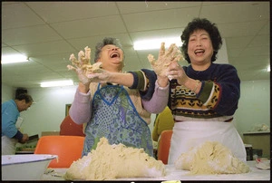 Ng Soon Yee and Mel Jean Chin preparing red bean dumplings for the Anglican Chinese bazaar in Wellington