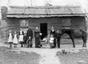 Group outside one of McCallum & Co's sawmill houses