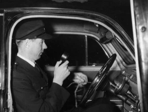 Traffic inspector Watson inside a patrol car