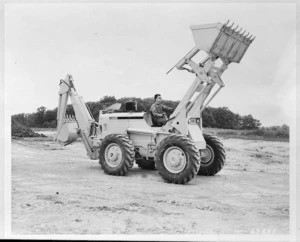 Man operating Case digger - Photographer unidentified