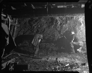 Miners working a wet face in the Blackball coal mine