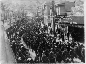 Zachariah, Joseph, 1867-1965 :Photograph of 8th Reinforcements walking down Manners Street, Wellington