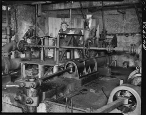 Mr W McVicar operating the hydraulic brake at Paparoa Mine, Westland - Photograph taken by K V Bigwood