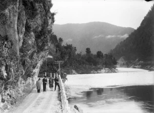 A view of Buller Gorge showing 3 men and a woman