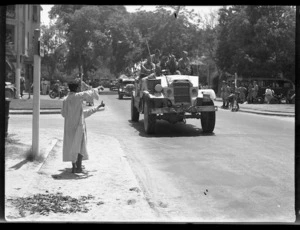 New Zealand trucks passing through Maadi, Egypt, during World War 2 - Photograph taken by H Paton