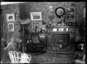 Interior view of a living room, circa 1900