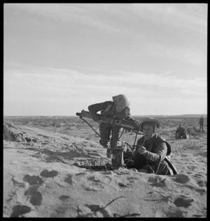 New Zealand machine gunners in action in Tripolitania during World War 2 - Photograph taken by M D Elias