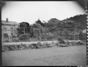 House and tennis court across lawn, Homewood, Karori, Wellington