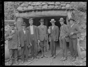 Group at the opening of a tunnel housing the Orongorongo waterpipe, Wellington