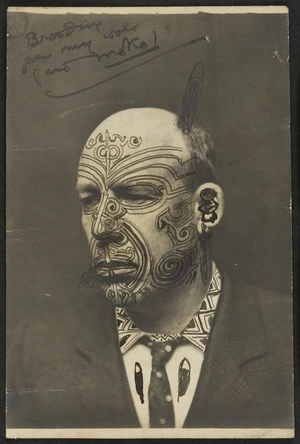 Photograph of James Cowan, with a moko drawn in pen