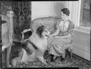 Jean Sutherland seated with collie at Homewood, Karori, Wellington