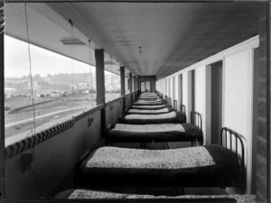 Verandah with row of beds, Samuel Marsden School, Karori, Wellington
