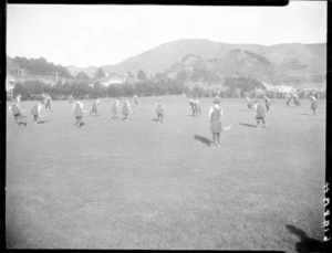 Students playing hockey, Samuel Marsden School, Karori, Wellington