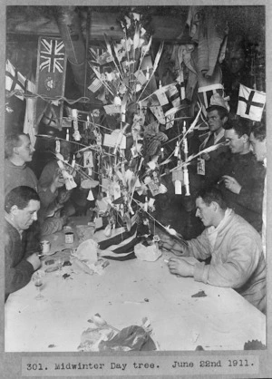 Members of the British Antarctic Expedition of 1911-1913 around a Midwinter Day tree at Antarctica