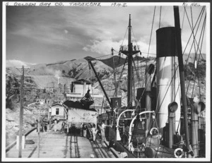 Ship unloading coal for the Golden Bay Cement Company at Tarakohe - Photograph taken by W Walker