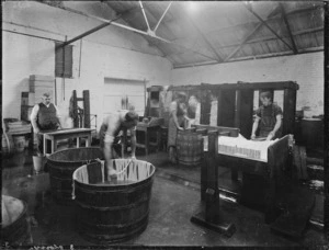 Men preparing sausage casings at Islington Freezing Works, Canterbury