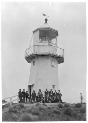 Group gathered in front of Pencarrow Lighthouse, Wellington