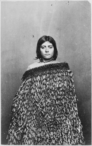 Young Maori woman wearing a cloak