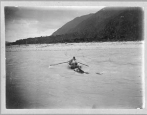 Willy and Harry Gunn rowing across the Whataroa River, Westland