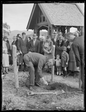 Frederick Matthews planting a tree at Saint Saviour's Anglican Church grounds in Kaitaia