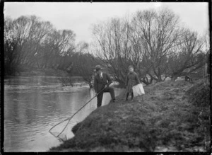 Henry Gurr and his son whitebaiting on the Taieri River.