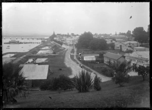 View of Tauranga from the Redoubt showing a street on the waterfront, 1924.