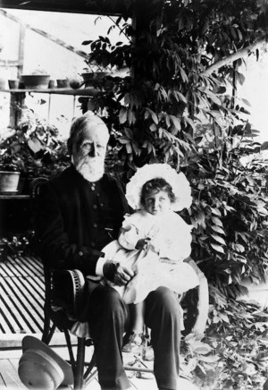 Canon Samuel Williams with a child