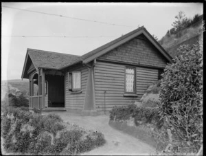 Exterior of a bungalow designed by Samuel Hurst Seager, 5 The Spur, Sumner, Christchurch
