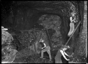 Three men in a mine