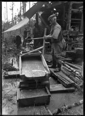 Three men working at a foundry?