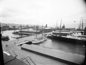 View of Queen's Wharf, Wellington, showing the ships "Huanui" and "Tamahine" moored in the harbour