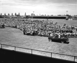 Her Majesty the Queen Mother being driven past children at the civic welcome at McLean Park in Napier