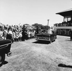 Children at the Civic welcome at McLean Park in Napier cheering for Her Majesty the Queen Mother