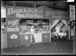 Stall at a trade fair advertising and displaying Horlick's, the original malted milk