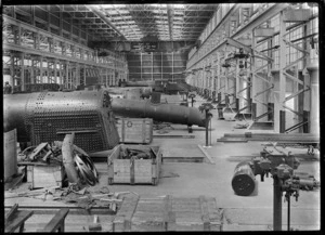Interior view of one of the railway workshops, showing a firebox in the foreground