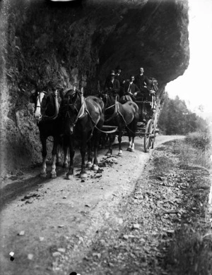 A horse-drawn coach at Hawkes Crag on the Buller Gorge Road