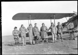 Arrival of the Southern Cross at Christchurch. Crew posed with the plane