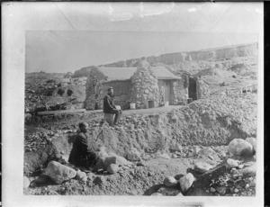 Chinese miners in front of a stone cottage, Central Otago