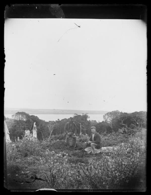 Outdoor scene with two unidentified men, Chatham Islands