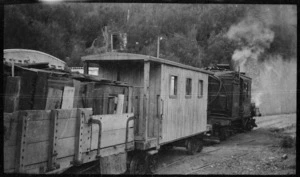 Climax steam locomotive, hauling goods wagons, probably a logging train