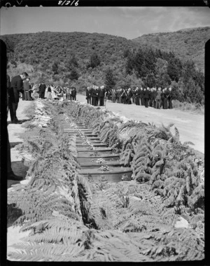 The Duke of Edinburgh at mass burial of Tangiwai Railway disaster victims, Karori Cemetery, Wellington - Photograph taken by E Woollett