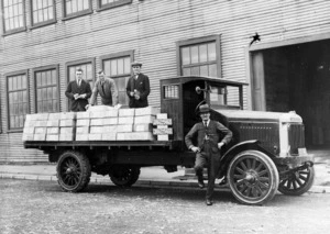 International truck carrying a load of vehicle number plates