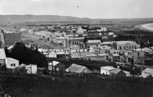 Looking over the township of Oamaru where in the foreground the firm 'Anderson's' is advertised