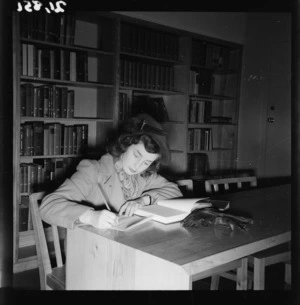 Annette Barber working inside the United States Information Library, Wellington
