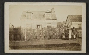 D Pierce outside a dwelling house in Abel Smith Street, Wellington - Photograph taken by Wrigglesworth and Binns