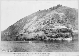 Train alongside the Hutt River, showing retaining walls