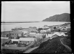 View of Whakatane Harbour and buildings along the waterfront.