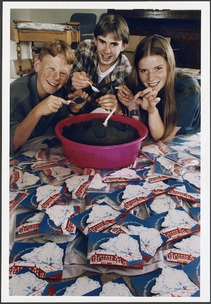 Aorangi Ski Club members packaging ash from the eruption of Mount Ruapehu into Christmas cards - Photograph taken by Phil Reid