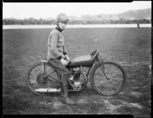 Duff, speedway rider, on Harley-Davidson motorcycle, at Kilbirnie stadium, Wellington